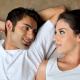 Flirting couple lying down