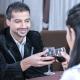 Couple flirting over a glass of wine